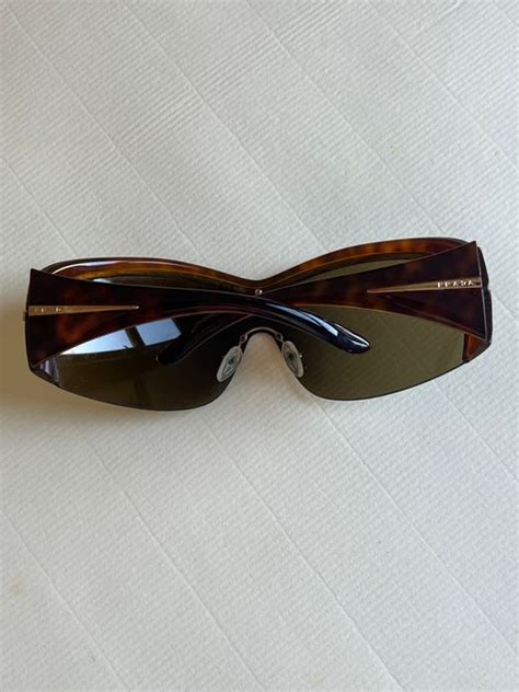 prada shield sunglasses tortoise shell gold|Prada Shield Sunglasses Tortoise Shell Style Frame Sport Gold .